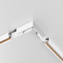 Maytoni Exility-S TRAMN034CL-41W Готовый угловой белый горизонтальный 90° соединитель накладных и подвесных низкопрофильных шинопроводов (треков) серии Exility-S, 100x100x26мм